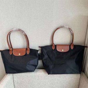 Nouveau sac à bandoulière en Nylon design boulette sac à main étanche sac pour femme une épaule sac de transport nouveau sac de voyage