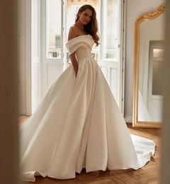 Nuevo vestido de novia de diseñador 2024 Fuera del hombro Satén Espalda abierta Una línea Corte Tren Vestidos de novia Princesa Vestido De Novia Robe De Mariage