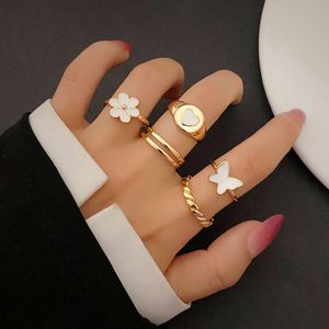 Nieuwe druppelolie Butterfly Bloem 5-delige Instagram Love Joint Ring Set