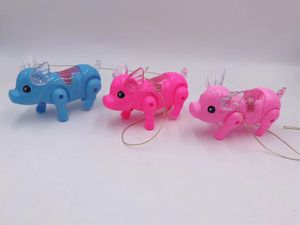 Nueva cuerda eléctrica cerdo iluminación creativa concierto muñeca para caminar cartón música intermitente cerdo juguetes para niños puesto de venta de mascotas electrónicas