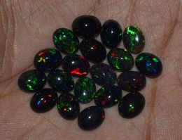 Nieuwe Ethiopië Zwarte opaal edelsteen losse 6x8mm ovale steen H1015