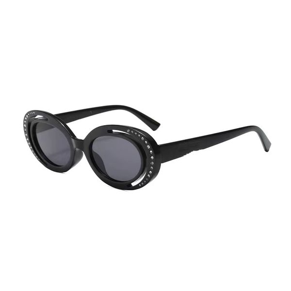 Nuevas gafas de sol de moda de montura redonda pequeña con montura de diamantes calados europeas y americanas Gafas de sol de personalidad de lujo con protección solar premium para mujer al por mayor