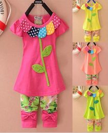 Nueva moda 2014 Conjuntos de ropa para niñas congeladas Conjunto de ropa floral para niños con trébol hermoso Conjunto de manga corta para bebés Conjuntos para niños Ropa 2047438