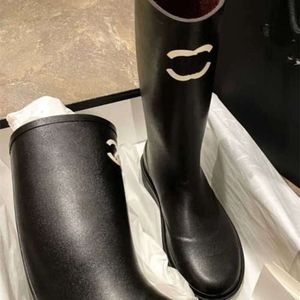 Nouvelle mode bottes en cuir noir chaussures à semelle extérieure imprimée pluie chaussures de mode