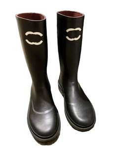 Nouvelle mode bottes en cuir noir pour femmes bottes de pluie chaussures de créateur à semelle extérieure imprimée