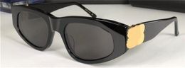Nouvelle mode et femmes populaires design lunettes de soleil 0095 petit style de cadre d'oeil de chat de qualité supérieure UV400 lunettes décoratives de protection avec boîte