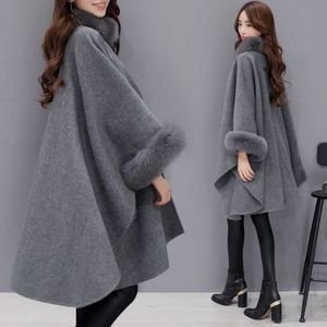 Nueva capa de moda versión coreana cuello de piel de zorro abrigo de lana de sección larga capa de temperamento chal abrigo de lana sin mangas para mujer regalo CALIENTE