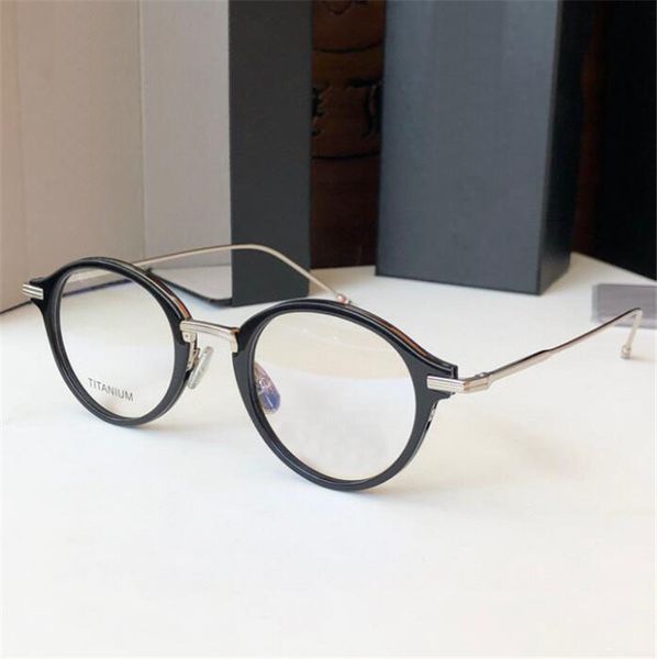 Nouveau design de mode lunettes optiques rondes 908 monture en acétate de titane style simple et populaire lunettes haut de gamme avec boîte peut faire des lentilles de prescription