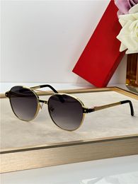 Nieuwe modeontwerp ronde vorm piloot zonnebrillen 0601s voortreffelijke elektroplating k gouden frame klassieke populaire veelzijdige stijl buiten UV400 Beschermingsglazen