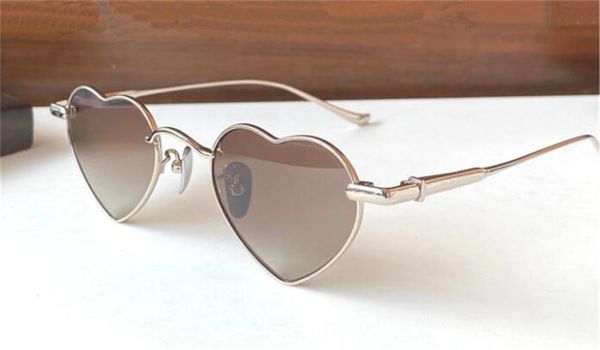 Nuevo diseño de moda gafas de sol para mujer 8063 marco de metal en forma de corazón vintage estilo simple y popular gafas protectoras uv400 de alta calidad