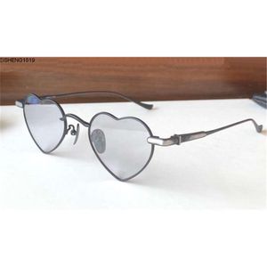 Nieuw modeontwerp vrouw zonnebril retro hartvormig metalen frame eenvoudige en populaire stijl van topkwaliteit beschermende bril