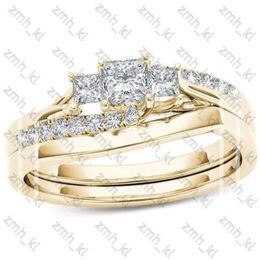 NIEUWE FASEMENDE Designer sieraden Wedding Rings 2pcs Bridal Set Elegant Crystal Engagement Ring Luxe Gold Color Round Hart Zirkon voor vrouwen Boho Jewelry 227