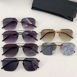 Nieuwe modeontwerper SL312M-zonnebril voor heren en dames Kwadraat metalen frame met halve rand Nylon lenzen Cassandre versierd Unieke charme Zonnebrillen Kustbrillen