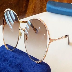 Nouveau créateur de mode femmes lunettes de soleil 0595 grand cadre rond cadre creux simple lunettes populaires de qualité supérieure uv400 lentille extérieure ey263F