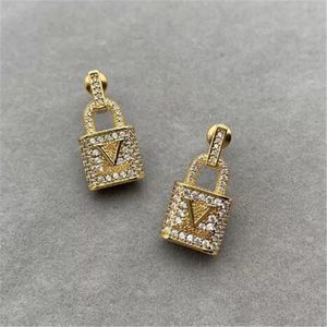 Nieuwe mode -oorbellen Designer Luxury Diamond Studs Key Lock Letters Gold Earring Women Party Wedding Sieraden