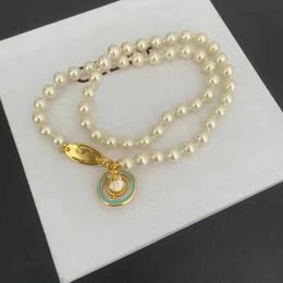 Nouvelle mode dames collier pendentif vente marque collier planète collier Saturn perle collier Satellite clavicule chaîne emballage exquis