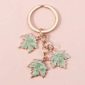 Nouvelle mode feuille d'érable porte-clés émail plante porte-clés pour femmes hommes sac à main pendentifs bijoux à bricoler soi-même artisanat accessoires