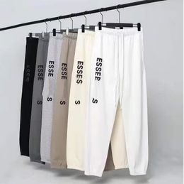 Nueva moda para hombre pantalones de diseñador ESS hombres mujeres pantalones de color sólido pantalones hip hop pantalones de movimiento para hombre casual joggers