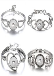 Nieuwe mode verzilverde Hollow Rhinestone Hearts Snap Bracelet Bangle 22 cm Fit 18mm Snap Button sieraden hele2551055