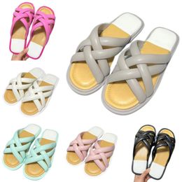 Nieuwe mode-pantoffels Luxe designer-sandalen Outdoor geweven strandschoenen Snoepgelei-schoenen met sleuven Casual letterplatformschoenen Platte schoenen voor dames