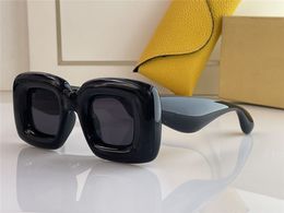 Nouvelles lunettes de soleil de mode 40098 Couleur de conception spéciale Cadre de forme carrée Avant-garde style fou intéressant avec des lunettes de qualité haut de gamme