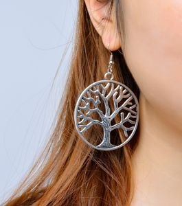 Nouvelle oreille Mode Bouffon Vintage Amitié Peace Arbre Suspending Boucles d'oreilles Élégant Charme Creux Dangle Boucles d'oreilles Boucles d'oreilles Fleur Bijoux pour femmes