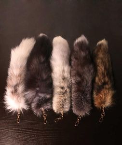 Nueva moda Lobo Fox Tail Fur Llaveros Unisex Pompom Colgante Coche Llavero Titular Lindo Llaveros Charm Bag Accesorios Regalos G10195123601