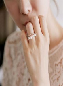 Nueva moda mujer coreana doble capa elegante perlas simuladas anillo ajustable brillante Rhinestone anillo de boda joyería de fiesta 2266266579