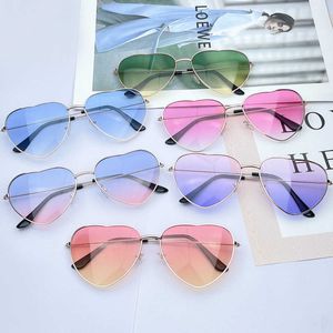 Nouveau métal à la mode Love Ocean Glass Sunglasses Peach Heart Womens Advanced Shaped