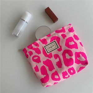 Nouveau Fashoin imprimé léopard femmes sac cosmétique rétro fleur dames pochette sac à main voyage sacs à main écolière crayon sacs de rangement