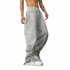 Nouveau Fi Leg Zipper Joggers Hommes Casual Lâche Baggy Pantalon de survêtement Cott Salopette Streetwear Hiphop Harem Pantalon de survêtement Vêtements T82q #