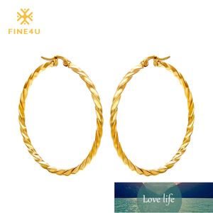 Nouveau FINE4U E007 Boucles d'oreilles créoles en acier inoxydable 316L Cercle rond Boucles d'oreilles torsadées pour femmes Bijoux de mariage Conception d'experts de prix d'usine Qualité Dernier style