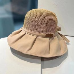 Nieuwe vissersvisor hoed Koreaanse versie van buitenzonhoed met grote dakrand Bow Cover Face Sunscreen Lady Hat