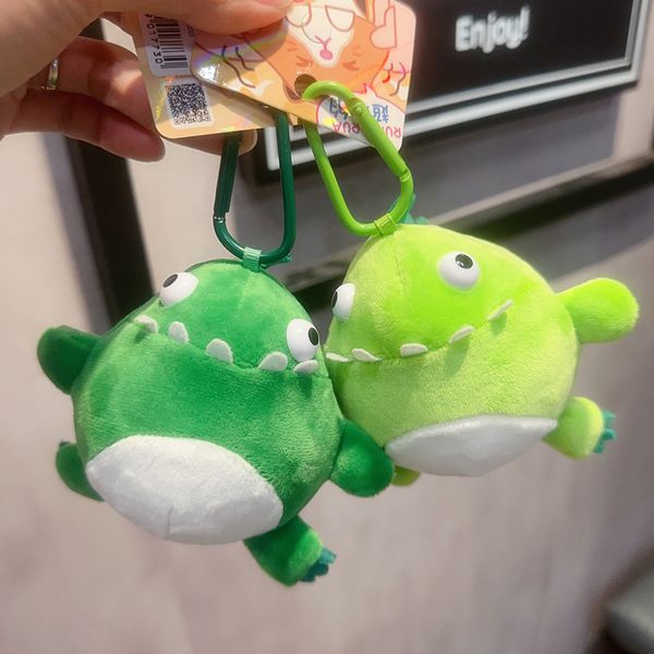 NOUVEAU véritable porte-clés de poupée de dinosaure en peluche créative, sac à dos mignon, machine à poupée, petit pendentif exquis