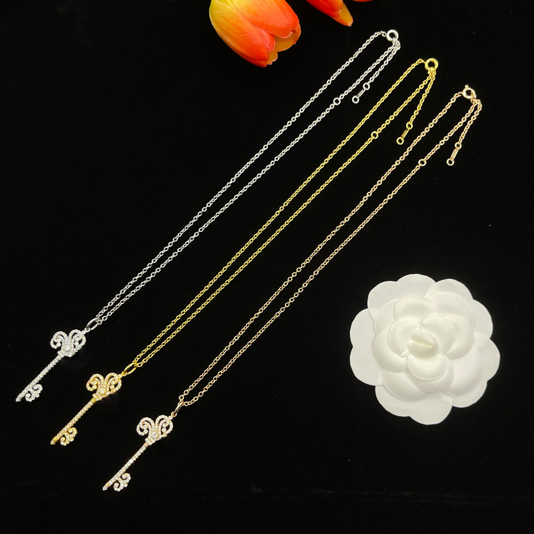 New Gold and Silver Necklace Fireworks Key Design Long Necklace Trend Fashion Temperament Sweet High Sense Necklace Dress Design Accessories