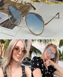 Nuevas lentes azules de gafas de sol Z1623W Lintos de cadena de diseñadores de marca Women anillo Round Big Circle Flores Gafas Firma 5526830