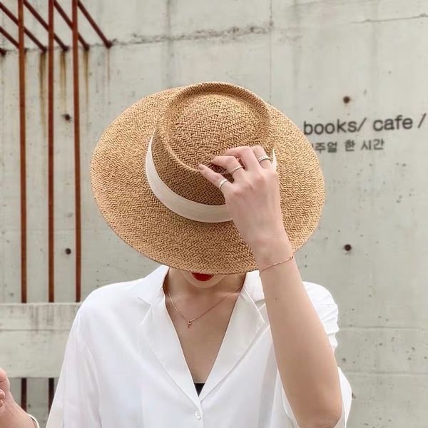 Nuevo sombrero de paja hecho a mano para la playa para mujer, vacaciones de verano, gorra de Panamá, moda cóncava plana, visera de protección solar, sombreros al por mayor Y200602