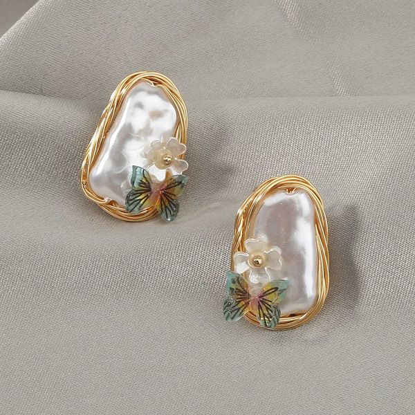 Nouveau Fil À La Main Enroulement Tempérament Exquis Femelle Imitation Baroque Perle Papillon Creative Mode dames Boucles D'oreilles shopping