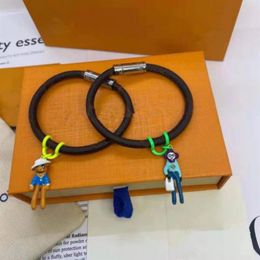 Nouveau bracelet en corde en cuir à motif vintage de haute qualité, pendentif de poupée, boucle magnétique, mode pour hommes et femmes holid255z