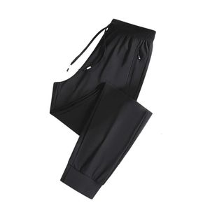 Nieuwe hoogwaardige ijs zijde Snelle drogende broek voor zomerse lichtgewicht en losse leggings, hoge elasticiteit oversized sportbroeken met hoge elasticiteit