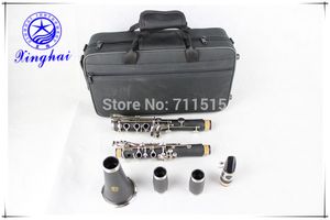 Nueva alta calidad Xinghai 17 teclas clarinete baquelita Drop B Tune marca instrumento occidental clarinete plateado con estuche