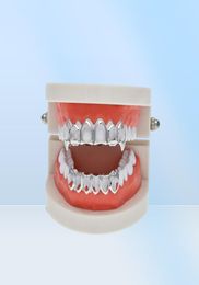 Nuevo Hip Hop Custom Fit Grill Six Hollow Open Face Gold Mouth Grillz Caps Parte superior inferior con dientes de vampiro de silicona Set6499014