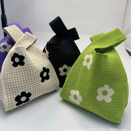 Nieuwe holle kleine gebreide Koreaanse versie Tote -tas, draagbare handtas, bloemtrendzak