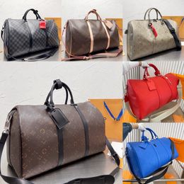 Nuevo bolso de lona de diseñador caliente Bolso de viaje de moda para hombres y mujeres Bolso clásico de gran capacidad Bolso de viaje de cuero de lona revestido impreso clásico bolso de embarque