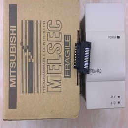 Nouveau dans la boîte Mitsubishi PLC FX2N-4AD FX2N-4DA contrôleur logique programmable accéléré 278O