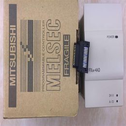 Nieuw in doos Mitsubishi PLC FX2N-4AD FX2N-4DA Programmable Logic Controller Expedited 265y