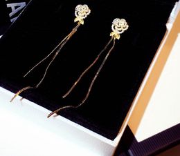 Boucles d'oreilles de créateurs de luxe de mode ins mousseux diamant fleur feuilles long gland goutte lustre balancent boucle d'oreille pour femmes filles