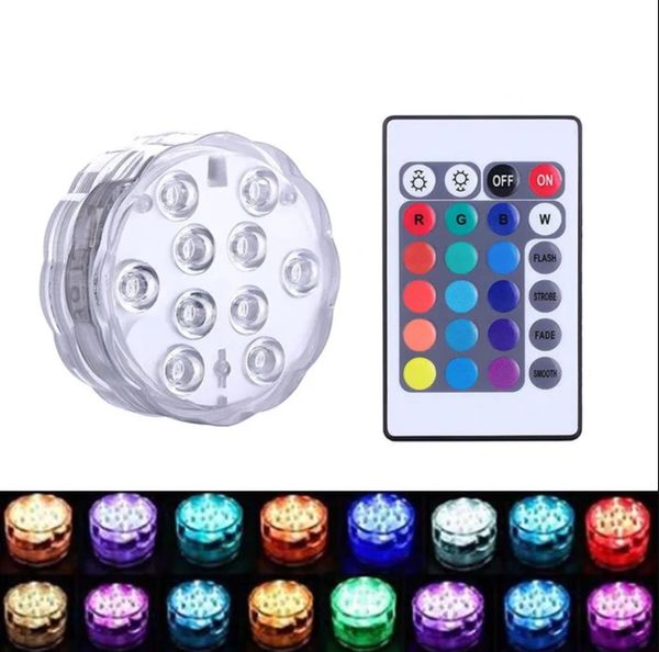 Nuevas luces LED sumergibles a prueba de agua IP68 Construidas en 10 cuentas LED con 24 teclas Control remoto 16 Cambio de color Lámpara de noche subacuática Florero de luz de té Fiesta Boda GG