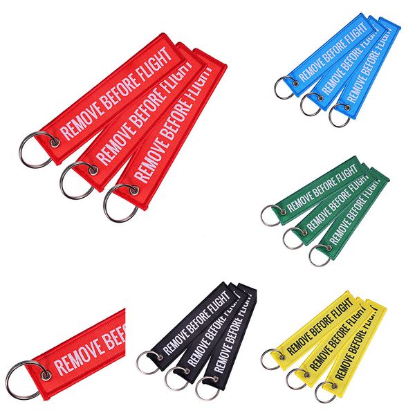 Nouveau Porte-clés RETIRER AVANT LE VOL Brodé Toile Couleur En Option Porte-clés Étiquette De Bagage Étiquette Aviation Accessoires De Mode 200 PCS C4330