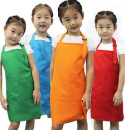 Nieuwe kinderen schort kind schilderen koken baby pinore massieve kleur keuken peuter schone schorten2804605